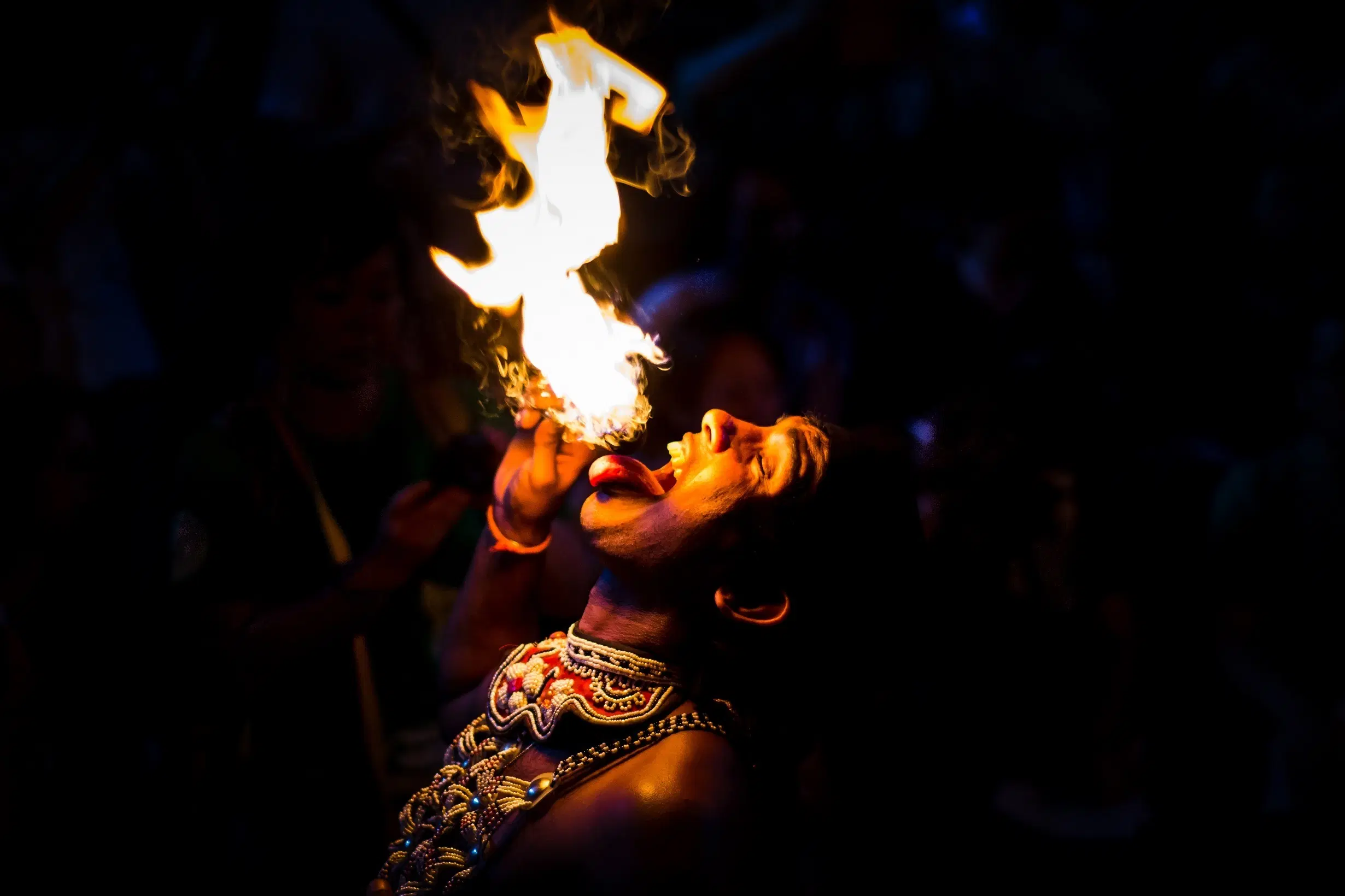 Traditional Kandyan dance performance with drummers and fire acts